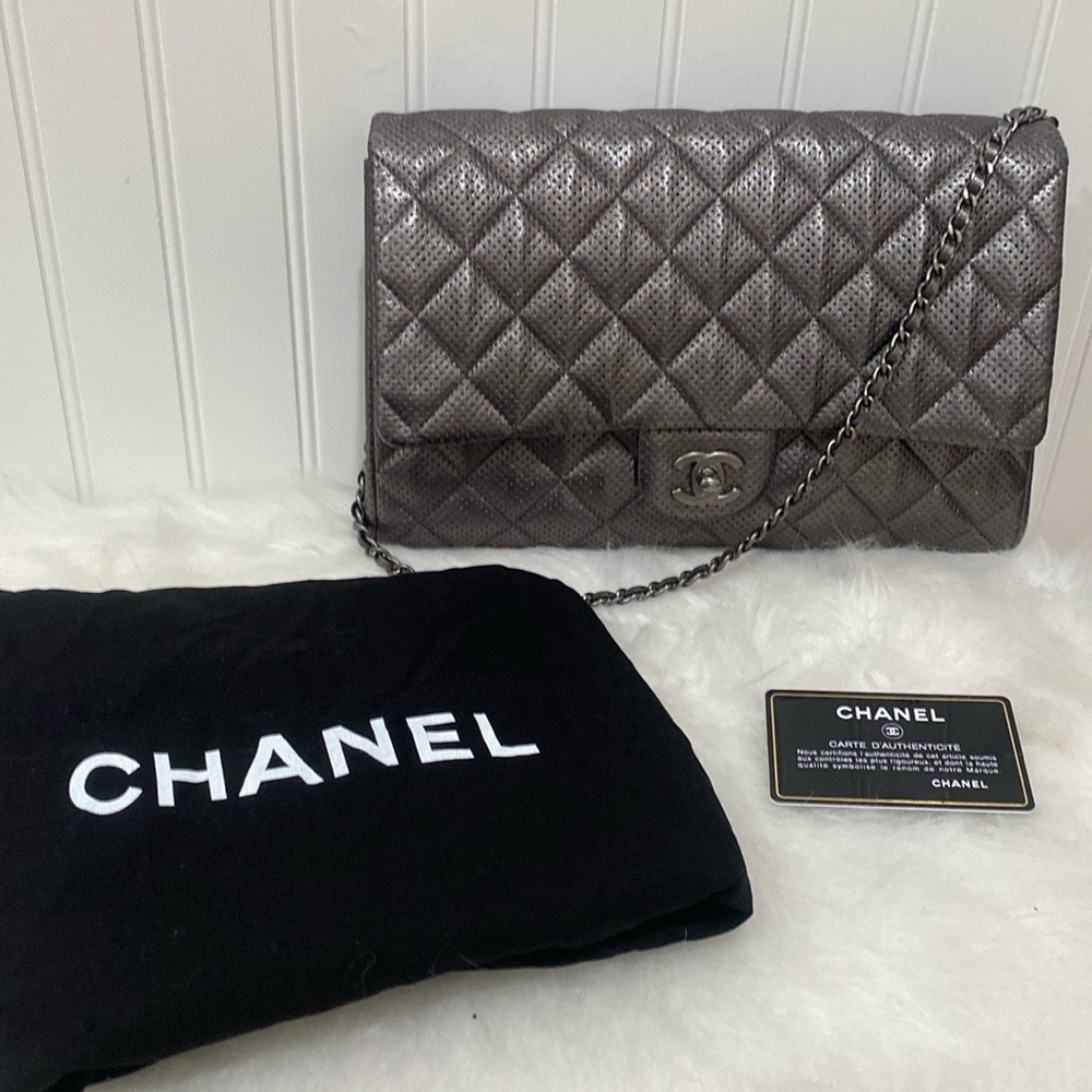 Authentic Chanel Perforated Quilted Clutch with chain